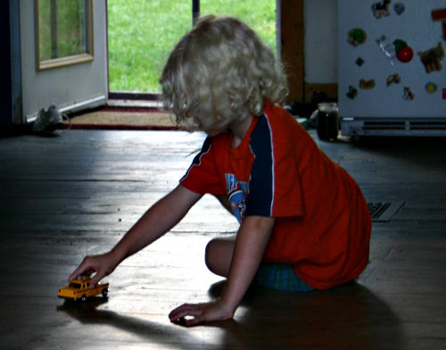 Playing on the kitchen floor in summer