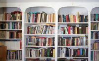 Bookshelves cover the room